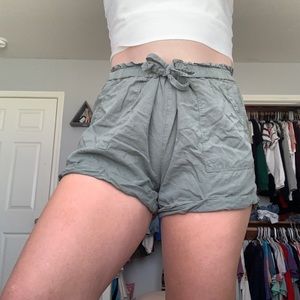 green paper bag shorts